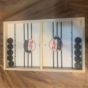 Super Winner Sling Puck Game